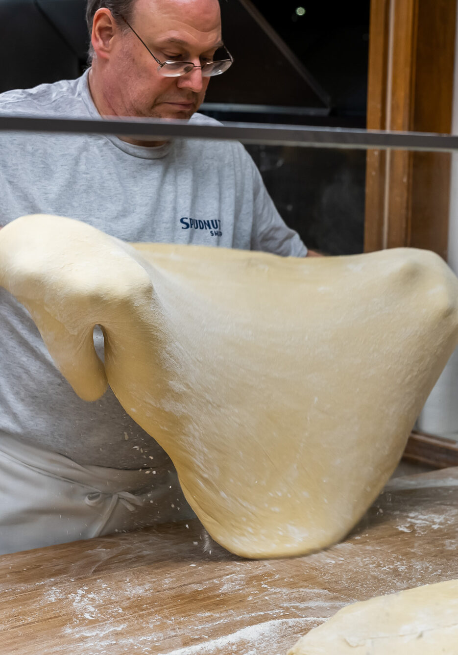 Spudnuts_process_0216 baker working with supdnut dough